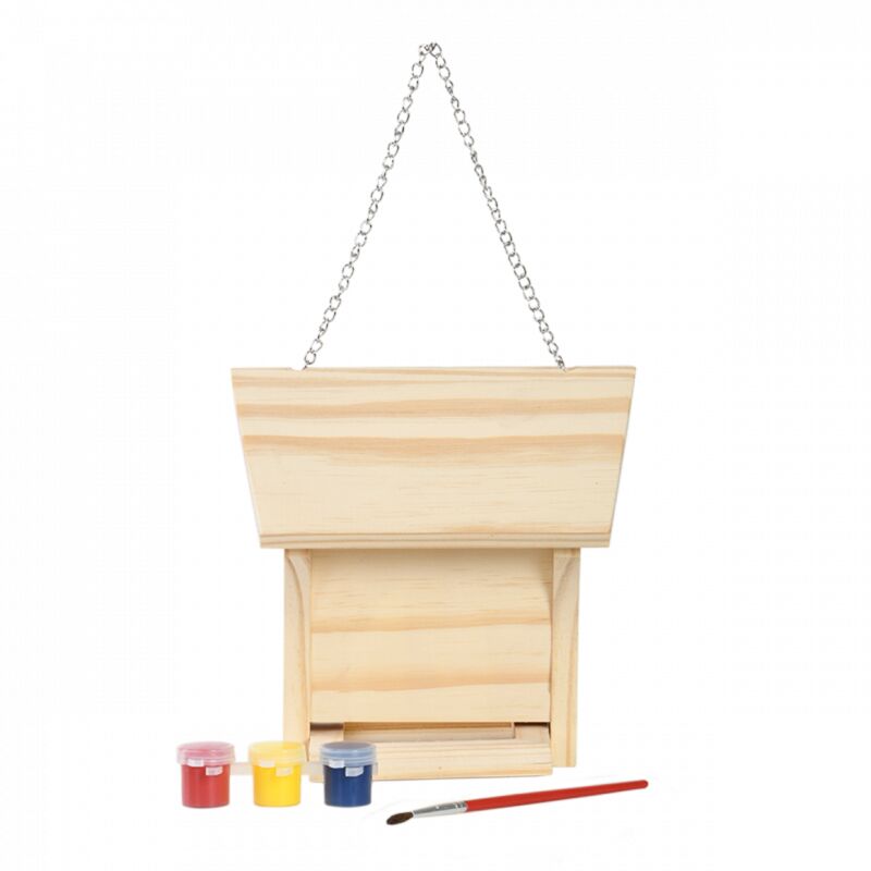 Wooden bird feeder with a sloped roof, featuring a hinged front, accompanied by four paint pots in red, yellow, blue, and a small brush, all hanging from a silver chain.