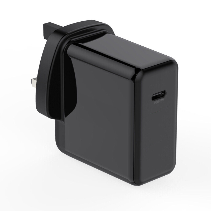 Black 65W USB-C PD charger with a compact design, featuring a single port and a foldable plug for easy portability.