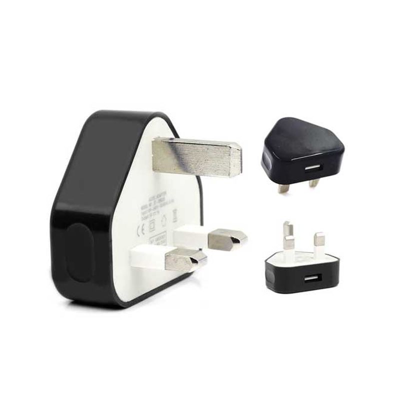 Compact black USB-A charger with a glossy finish, featuring three metal prongs and a single USB port, designed for 10.5W output and 2.1A at 5V.