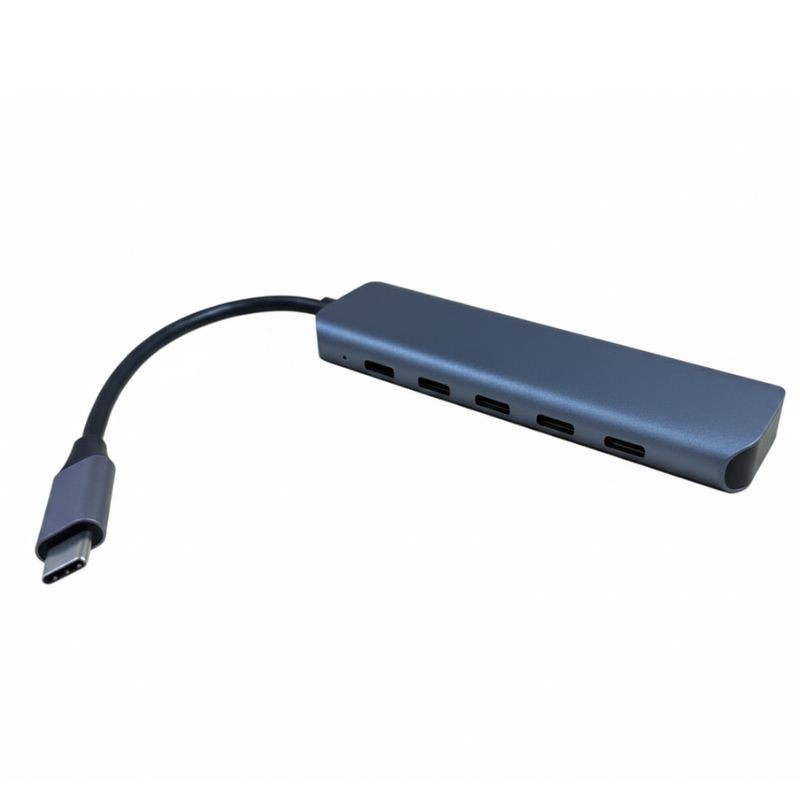 Gray aluminum USB-C hub with four USB-C 3.1 ports and one USB-C port for power delivery, featuring a flexible cable for easy connectivity.
