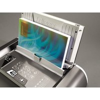 Graphite and white Fellowes Helios 30 thermal binding machine with document slot and control panel.