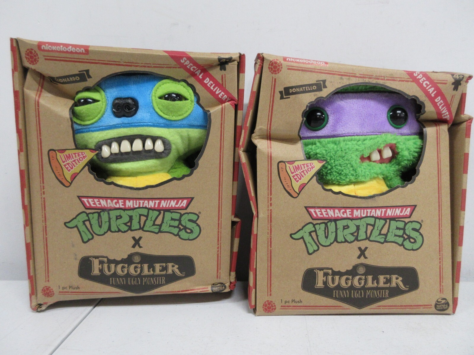 Fuggler TMNT Leonardo soft toy features a blue mask, green plush body, and a quirky smile, packaged in a colorful box with Teenage Mutant Ninja Turtles branding.