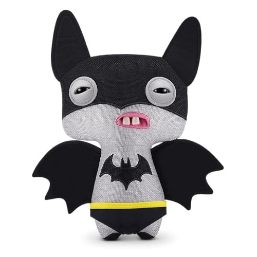 Fuggler X DC Batman soft toy features a quirky design with a gray body, black bat wings, a Batman logo, and a mischievous expression with prominent teeth.