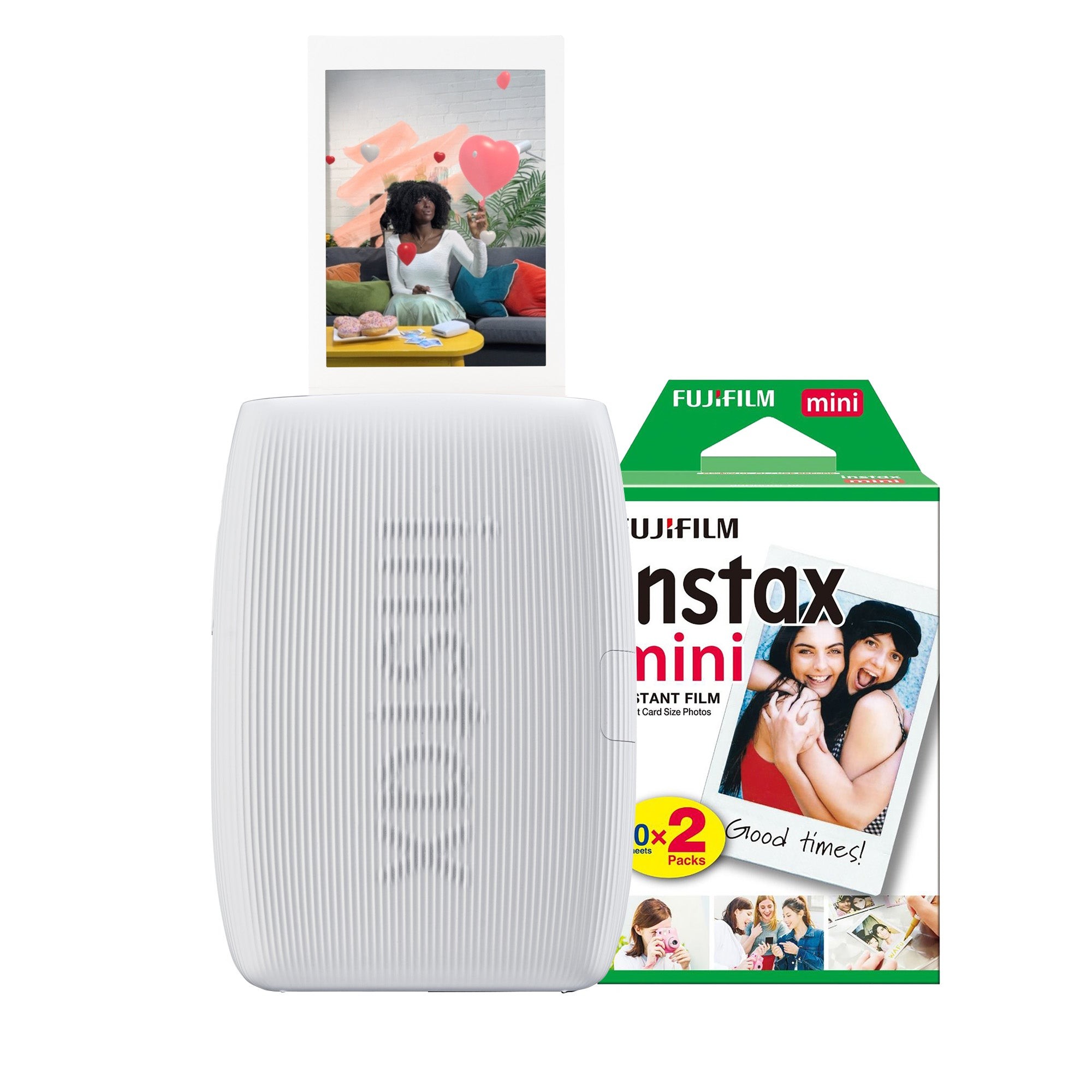 Fujifilm Instax Mini Link 3 printer in clay white, featuring a textured body, with a printed photo emerging, alongside a green box of Instax Mini film packs.