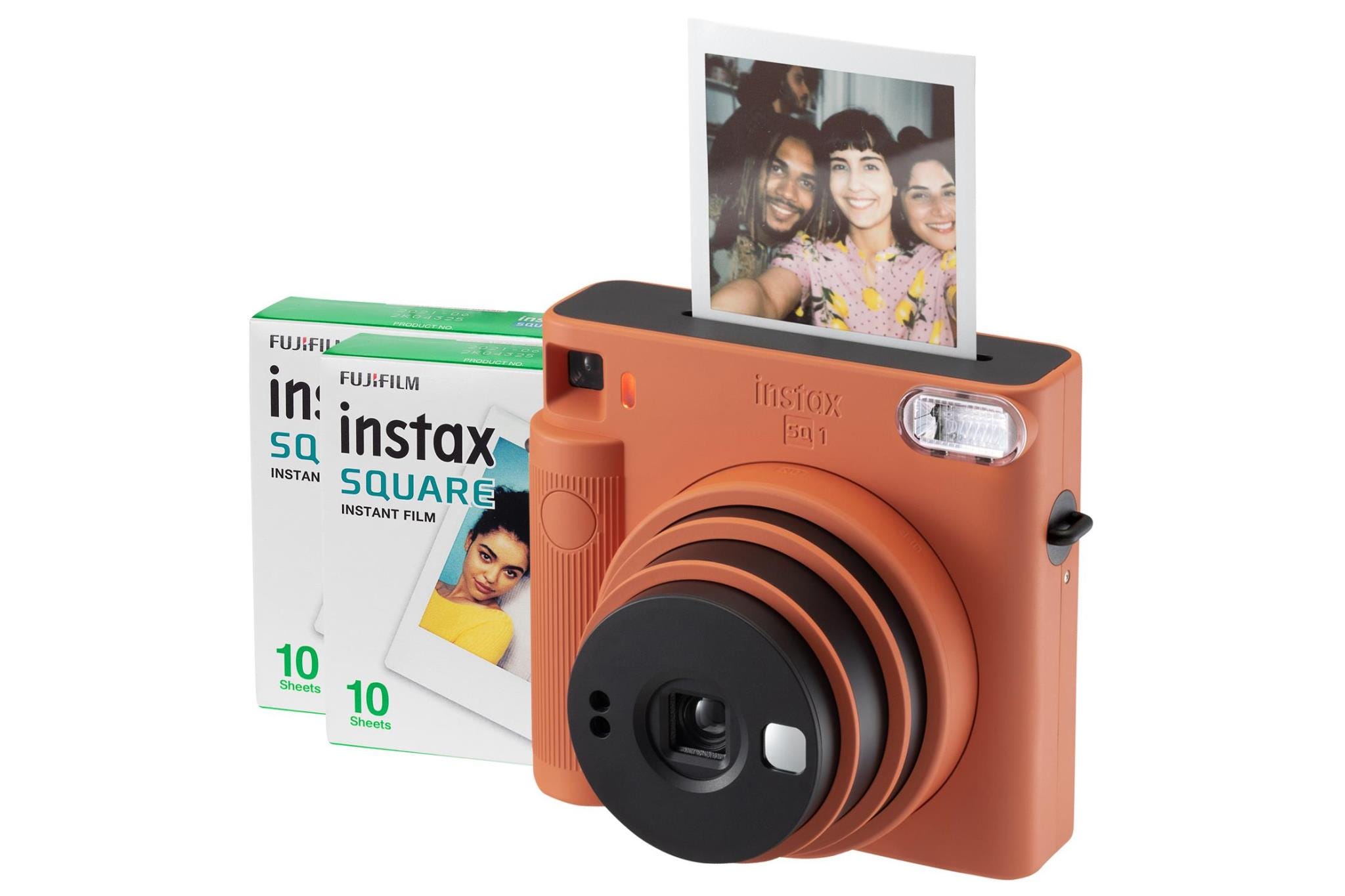 Fujifilm Instax Square SQ1 instant camera in terracotta orange, featuring a circular lens, a photo ejection slot on top, and a pack of instant film with 10 sheets.