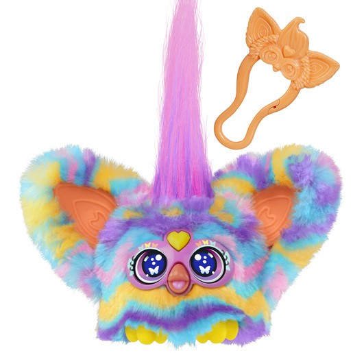 Colorful plush electronic pet with pastel blue, pink, and yellow fur, large expressive eyes, a heart on its forehead, and a pink hair tuft, accompanied by a matching hair accessory.