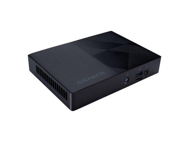 Compact black barebone PC with a textured geometric design, featuring Intel N100 CPU, USB ports, and power button on the front.