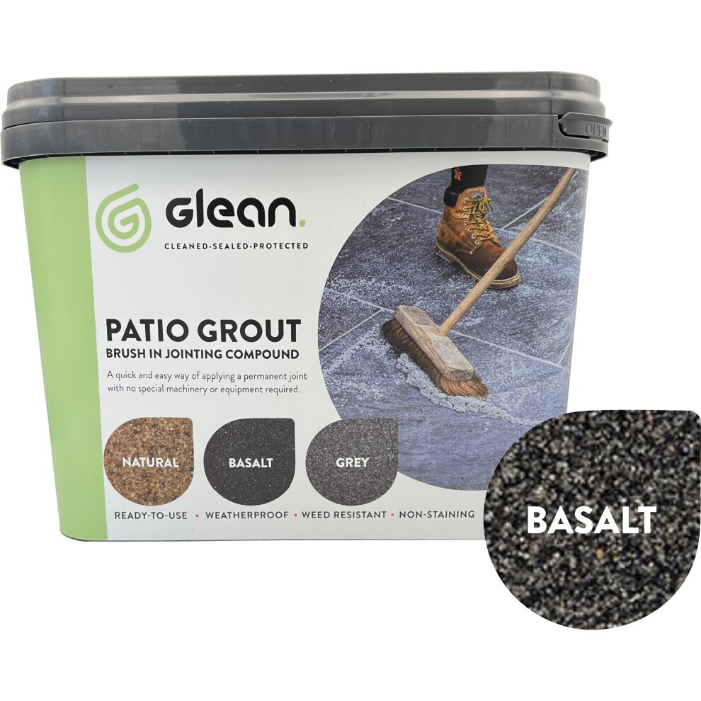 GLEAN Patio Grout Jointing Compound in Basalt color, 15kg bucket with a brush, featuring a textured surface and labels indicating weather resistance and non-staining properties.