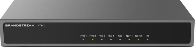 Grandstream Networks Analog FXO Gateway features a sleek silver metal casing with four FXO ports, two network ports, and five green LED indicators on the front panel.