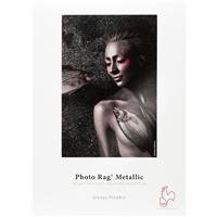 Textured, metallic paper with a glossy finish, featuring a close-up of a woman's face and body art, showcasing rich colors and intricate details on a dark background.