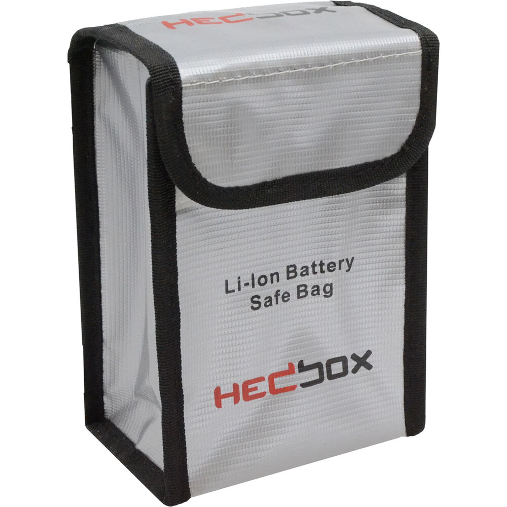 Silver fire-resistant battery storage box with a black trim, featuring a flap closure and printed "HEDbox Li-Ion Battery Safe Bag" logo on the front.