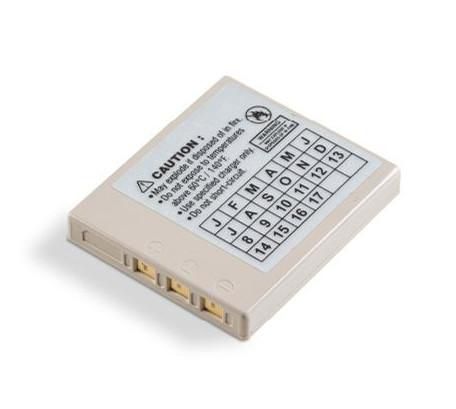 Honeywell BAT-SCN05 barcode reader accessory battery in a rectangular beige casing, featuring caution labels and a grid for date codes on the surface.