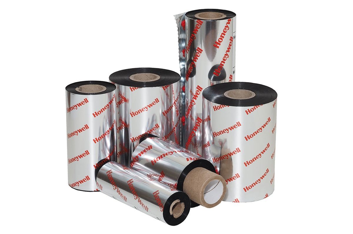 Black thermal ribbons in various sizes, featuring a shiny silver exterior with red "Honeywell" branding, designed for printing applications.