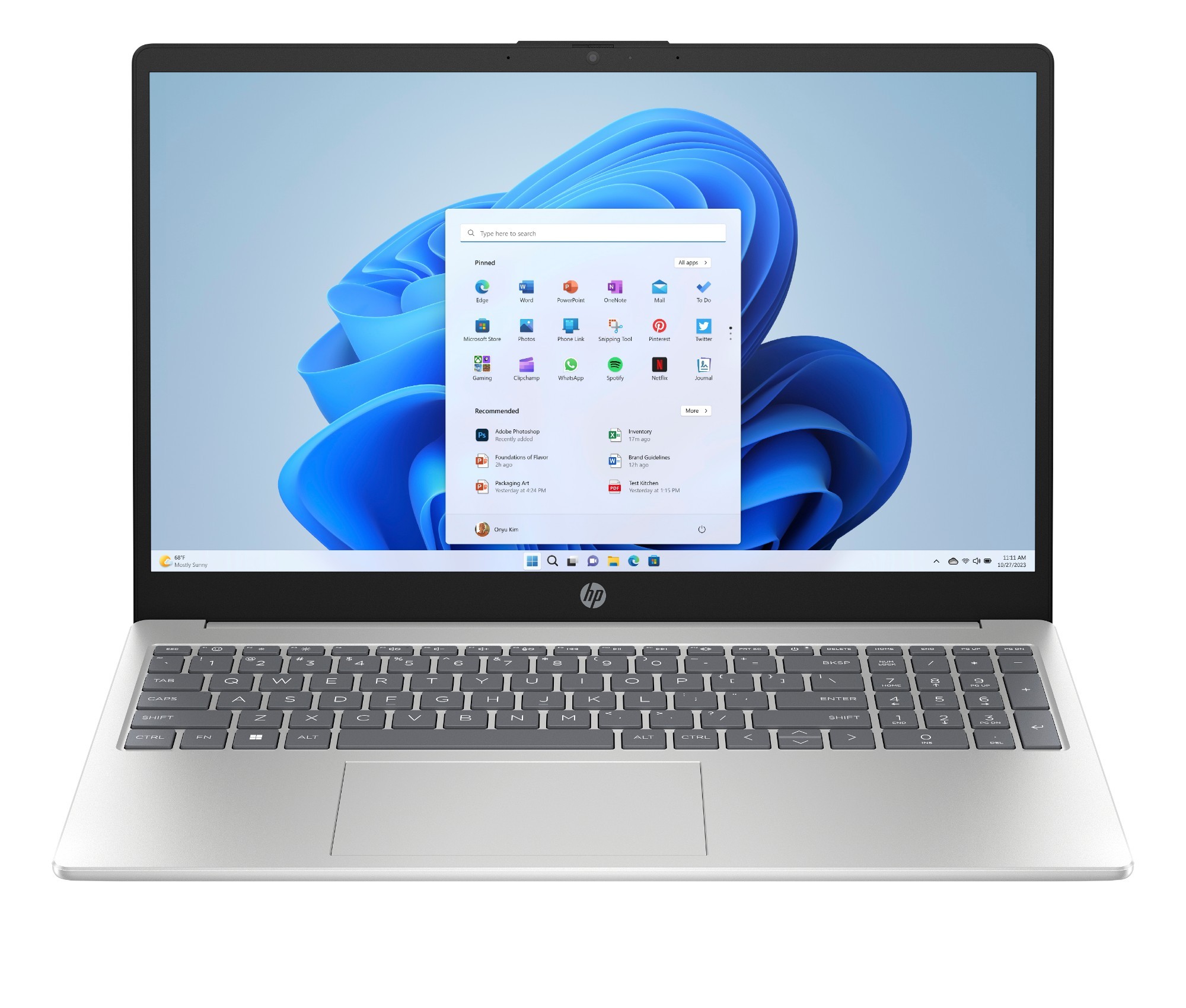 Silver HP laptop with a 15.6-inch display, featuring a Windows interface, a sleek design, and a full keyboard with a numeric keypad.
