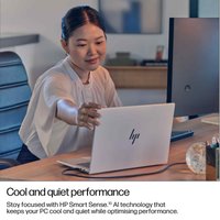 HP EliteBook 8 G1i 16-inch notebook, silver finish, open on a desk, featuring Wolf Pro Security Edition branding.