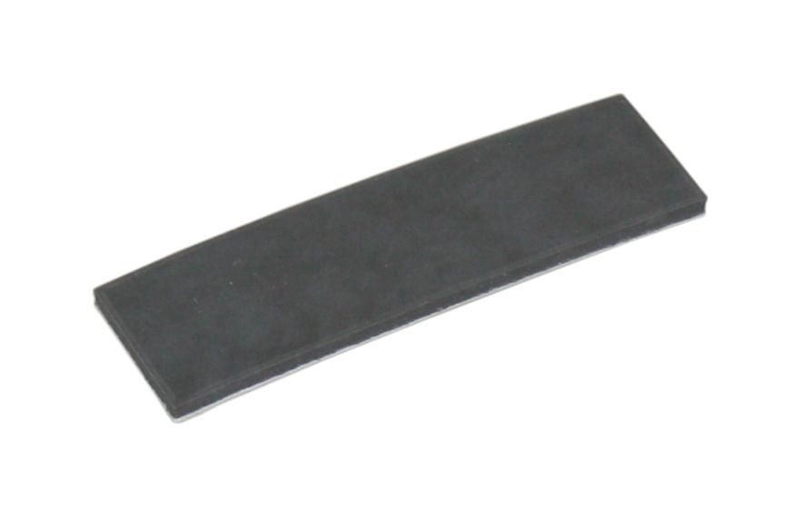 Black rubber friction pad with a rectangular shape and smooth surface, designed for use in various HP devices.