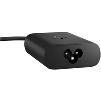 Black HP GaN USB-C 65W laptop charger with compact design and rounded edges.