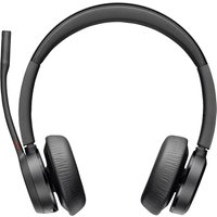 Black HP Poly Voyager 4320 headset with cushioned ear pads, adjustable headband, boom mic, BT700 dongle, and charging stand.