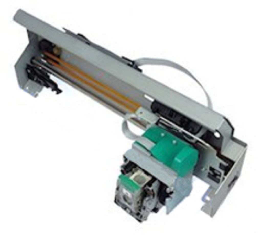 HP Spler Crrige Ssemly features a metallic frame with green and gray components, including a motor and wiring, designed for printer functionality.