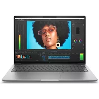 Silver HP ZBook 8 G1i laptop with 16-inch display, slim bezels, and backlit keyboard, showing video editing software.
