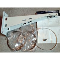 HPE Aruba white metal mounting bracket with screws, cable ties, and instruction sheet.