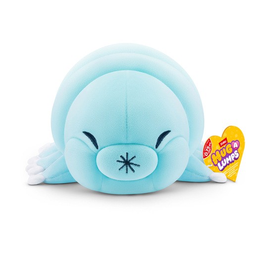 Cuddly small sage-colored plush toy with a rounded body, smiling face, and white feet, featuring a heart-shaped tag that reads "Hug-a-Lumps."