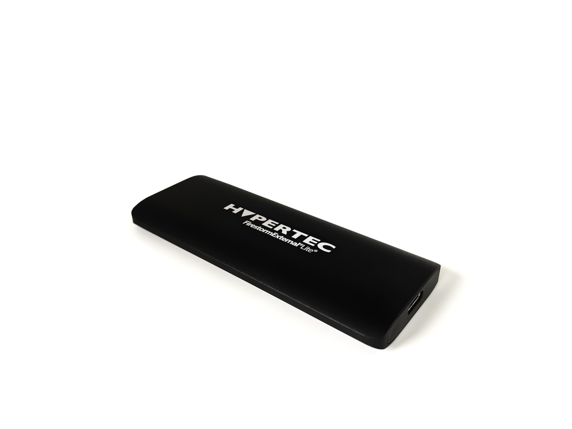 Black slimline aluminum external SSD with "HYPERTEC" logo, featuring USB 3.1 connectivity and a compact design, labeled as 256GB FirestormExternal Lite.