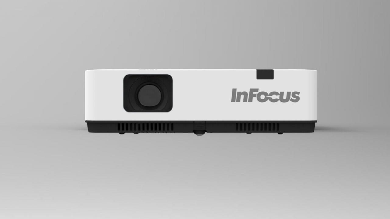 White InFocus IN1014 data projector with a black base, featuring a lens on the front, ventilation grilles, and the brand name prominently displayed on the side.
