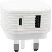White Juice AC plug with USB-A and USB-C ports, ribbed sides, and UK three-pin design.