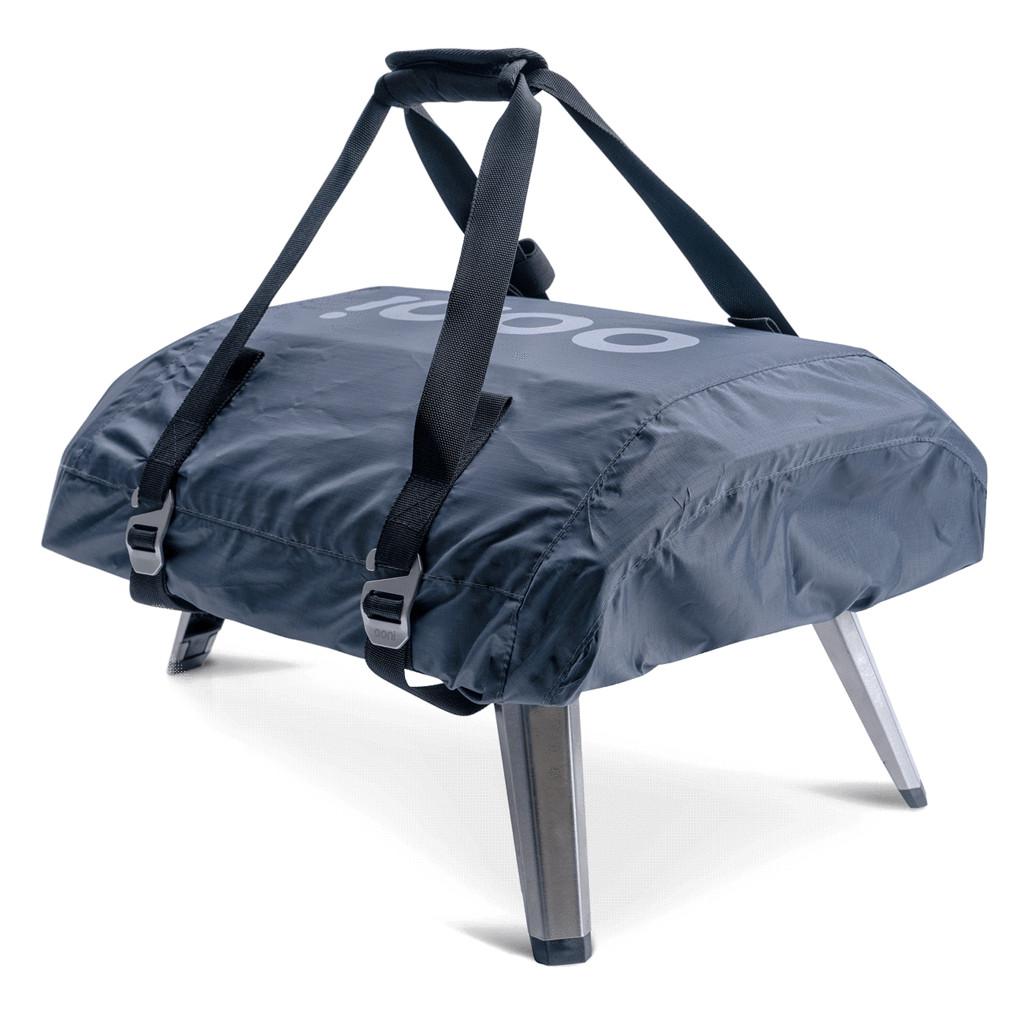 Durable black carry cover with adjustable straps, designed for the Ooni Koda 12 pizza oven, featuring a sleek logo and a protective, weather-resistant material.