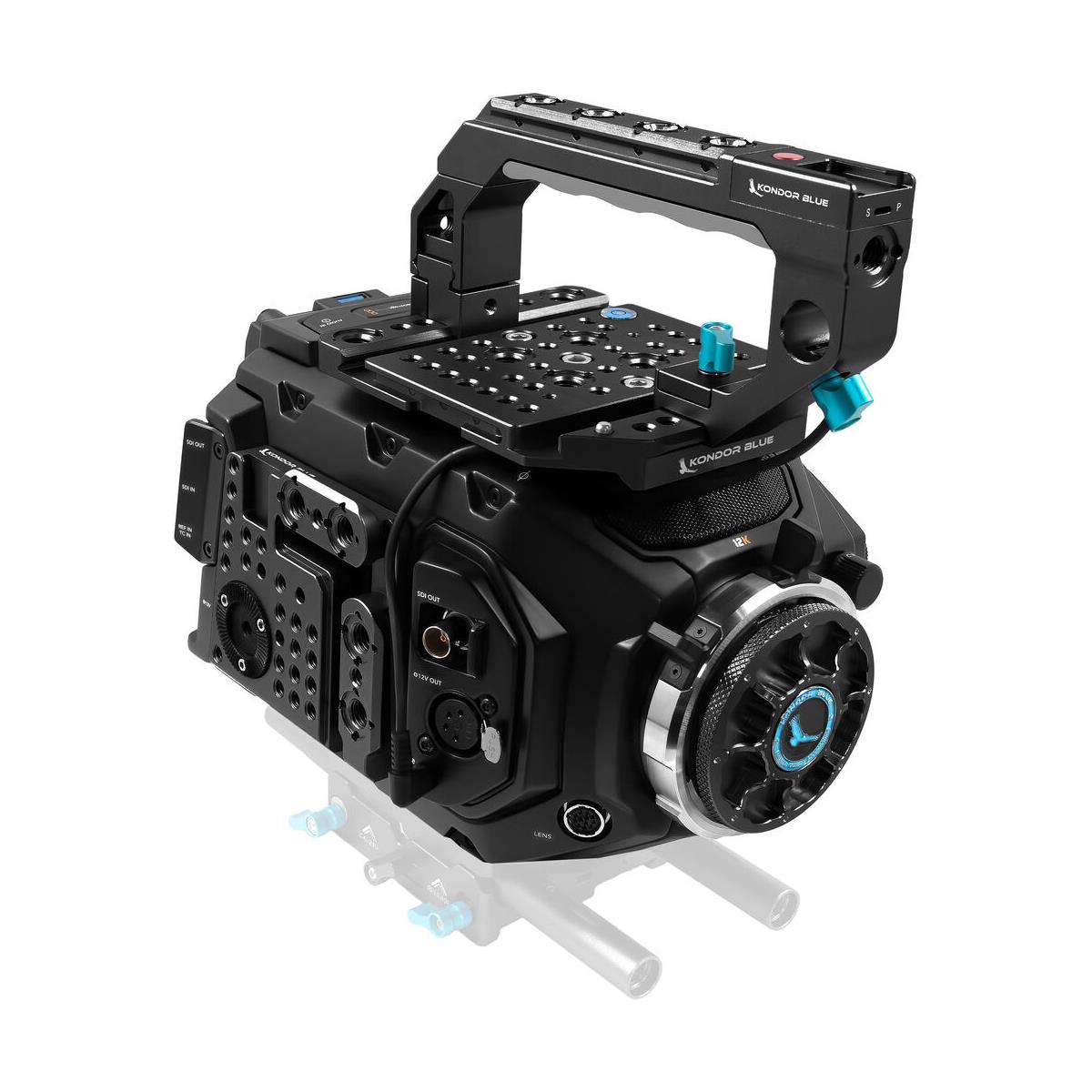 Black metal URSA Mini Cage with a textured grip handle, multiple mounting points, and blue accents, designed for 12K, 4.6K, and 4K cameras, featuring a sturdy build and ergonomic design.