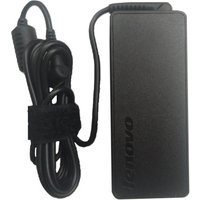 Black Lenovo 65W power adapter with rectangular shape, attached cable, and Velcro strap for cord management.
