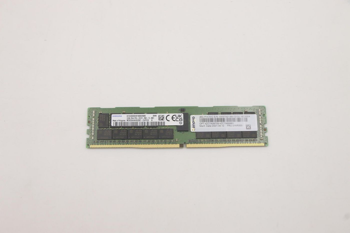 Lenovo 32GB DDR4 RDIMM memory module with a green PCB, gold connectors, and black memory chips, labeled with specifications and certification marks.