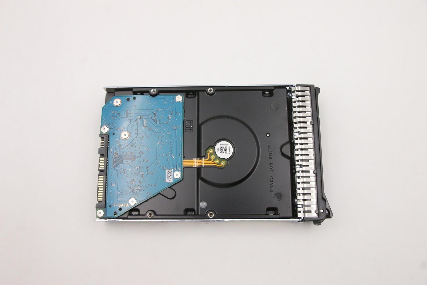Lenovo 4 S 7.2K 6G 3.5" HDD featuring a black metal casing, a blue circuit board on one side, and a silver heat sink along the edge.