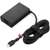 Black Lenovo 65W power adapter with rectangular body, USB-C connector, and coiled cable secured with a strap.