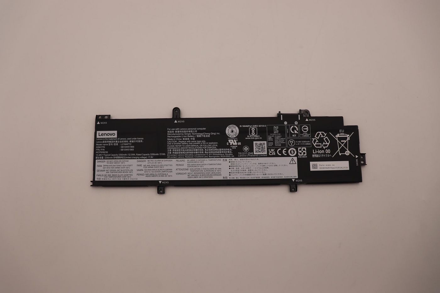 Black Lenovo 52.5Wh internal Li-ion battery featuring various labels, symbols, and specifications printed in white, with multiple connection points and a sleek, rectangular design.