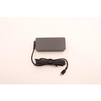 Black Lenovo 65W power adapter with rectangular shape and attached cable, compact design.