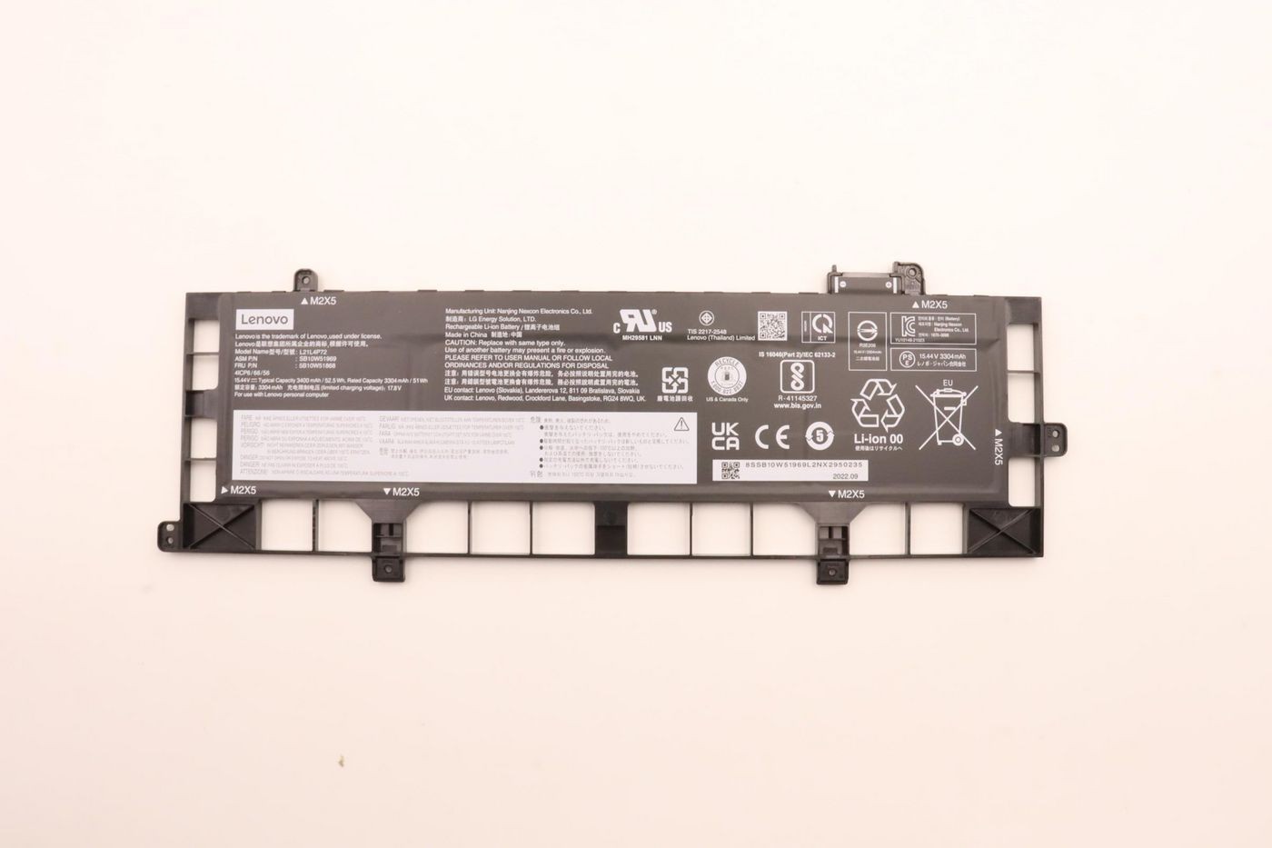 Lenovo 5B10W51868 laptop spare part battery, featuring a black plastic casing with printed specifications and safety symbols, designed for compatibility with Lenovo laptops.