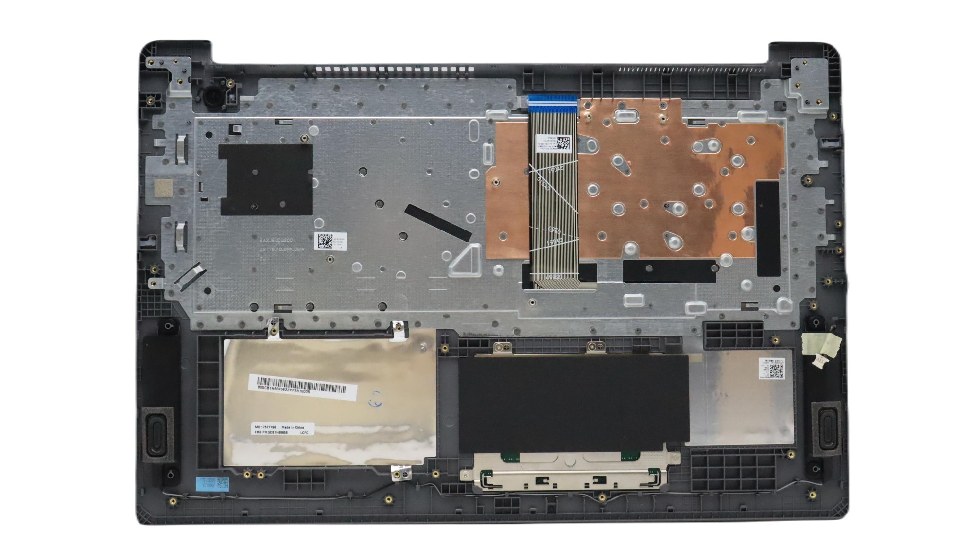 Lenovo 5CB1H80740 laptop spare part featuring a metallic cover with copper heat sinks, various circuit components, and a black plastic base for keyboard attachment.
