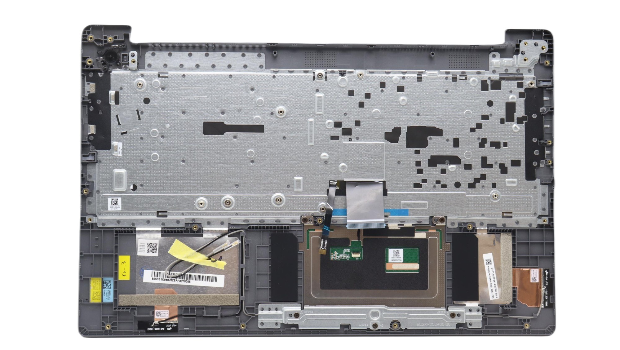 Lenovo 5CB1L99511 laptop spare part cover featuring a silver metal base with various internal components, including a keyboard area and adhesive labels.