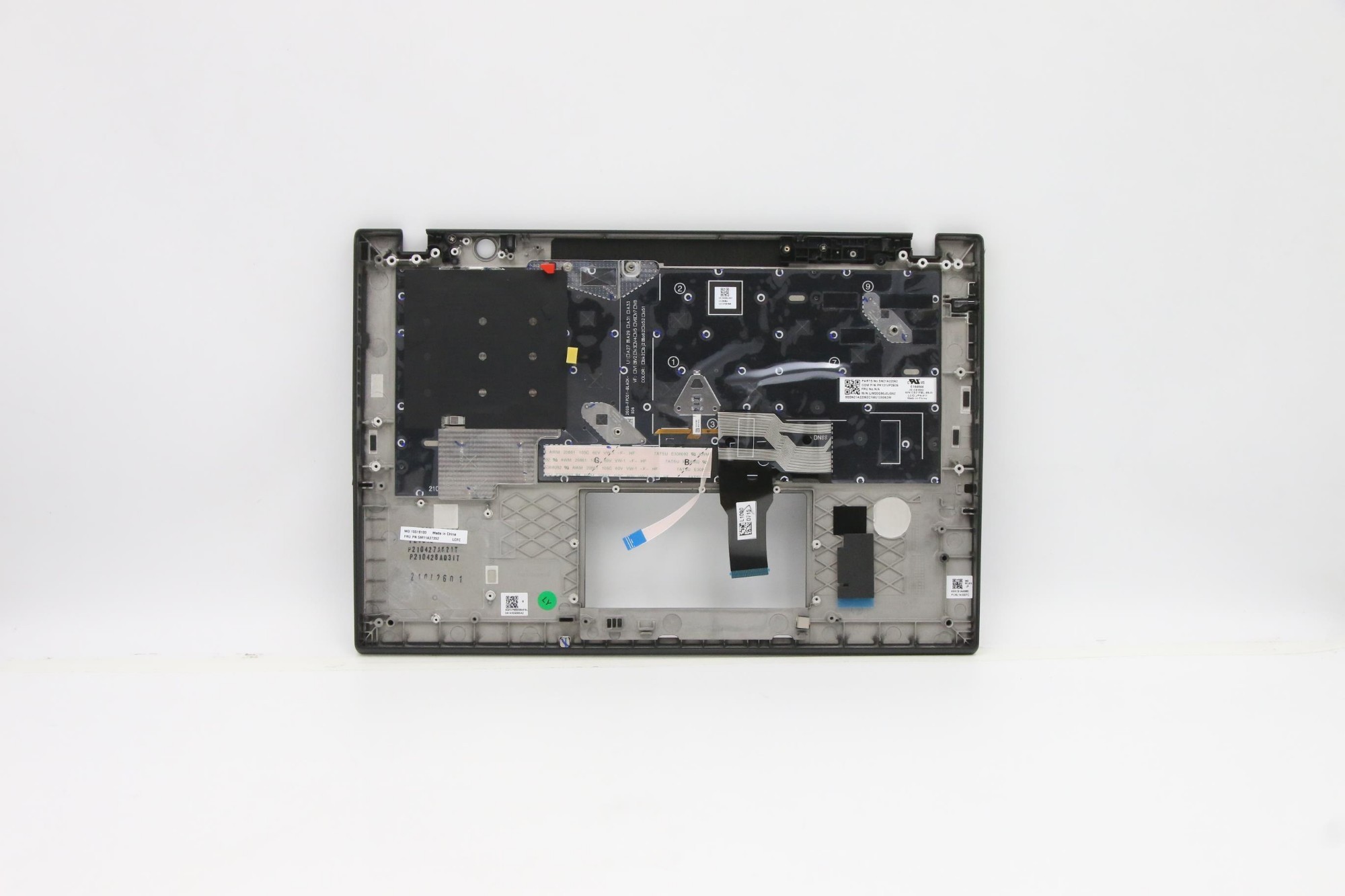 Lenovo 5M11A37303 laptop spare part featuring a black plastic cover with a keyboard layout, showcasing internal components and connectors visible on the underside.