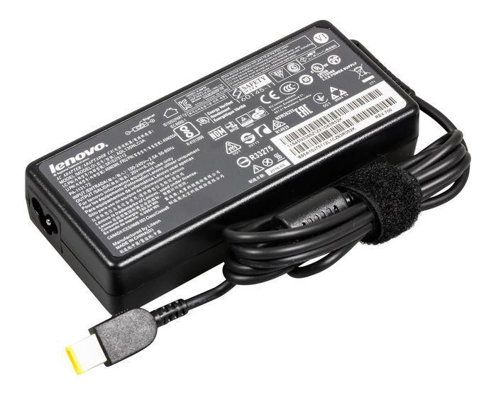 Black Lenovo C Dper power adapter (20V 6.75A) with a textured surface, featuring various certification labels and a yellow-tipped connector cable.