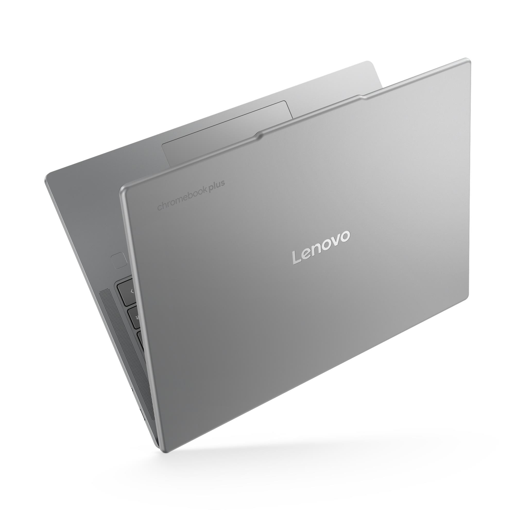 Silver Lenovo Chromebook with a sleek design, featuring a 14-inch touchscreen, 16 GB RAM, and 256 GB storage, showcasing the "Chromebook Plus" logo on the lid.