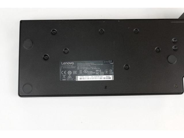 Black Lenovo FRU CS18 ME Dock with a smooth surface, featuring multiple ports and a label with certification details on the underside.
