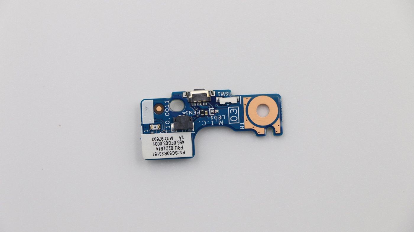 Blue printed circuit board with various electronic components, including a silver connector and a copper pad, labeled with white text and numbers.