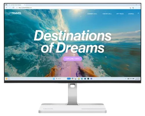 Lenovo L24D-4C monitor with a 23.8-inch Full HD display, featuring a sleek grey frame, slim profile, and a modern stand, showcasing vibrant colors on a travel-themed webpage.