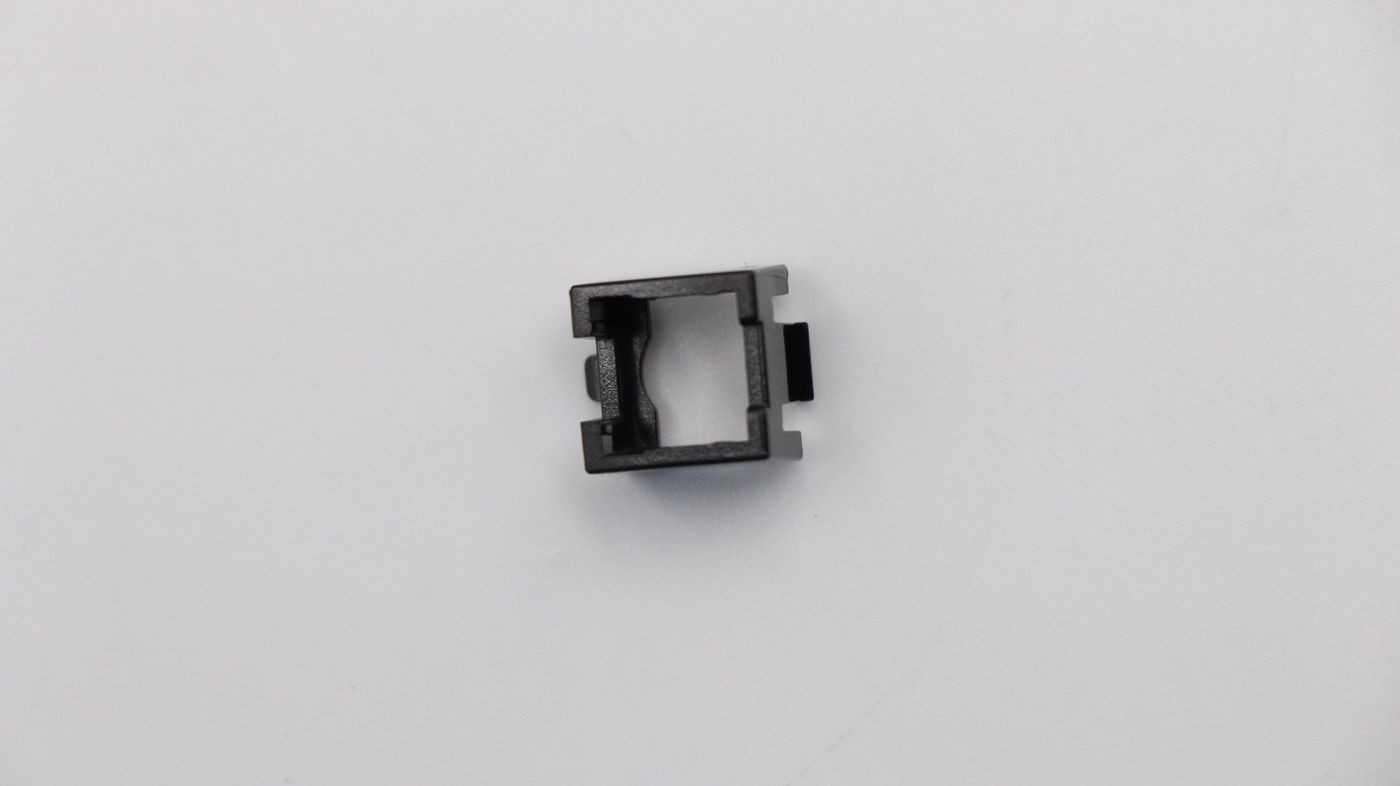 Black plastic Lenovo Power Switch Holder with a rectangular shape and a small tab on one side, designed to securely hold a power switch component.