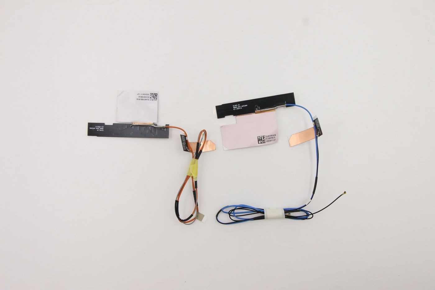 Lenovo WLN+WWN Nenn Ssemly features multiple flexible circuit boards with copper connectors, black and blue wires, and white adhesive labels on a white background.