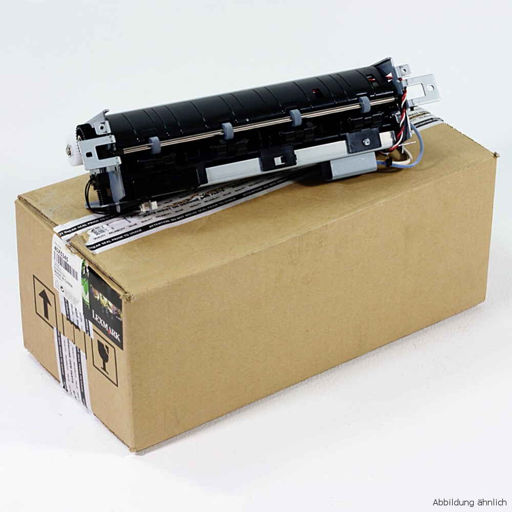 Black maintenance kit with metal components, designed for Lexmark printers, resting on a brown cardboard box with shipping labels, suitable for 200,000 pages.