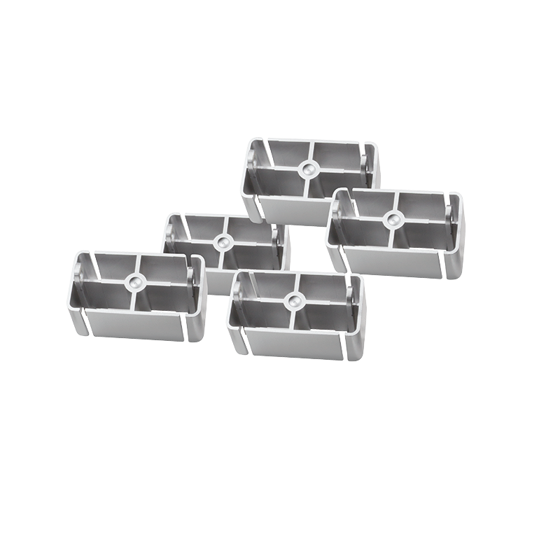Five flexible cable channel joints in a sleek silver finish, made from durable plastic, designed to organize and connect cables seamlessly.